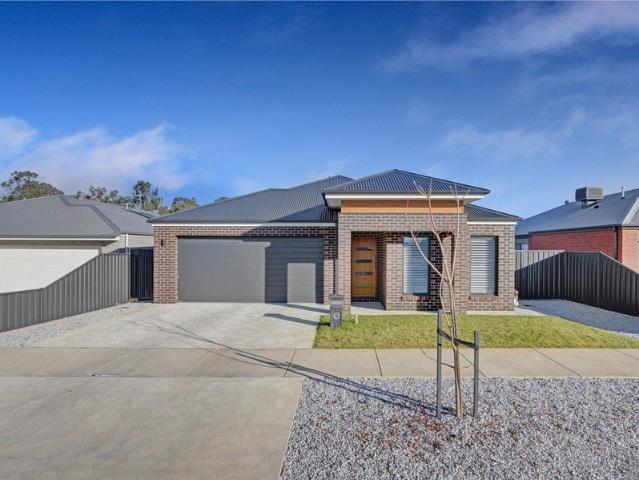 Modern Family Living in a Sought After Estate