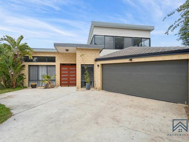 Modern Family Living in an Exclusive Oceanside Suburb