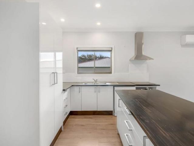 Modern Family Living In Central Location!
