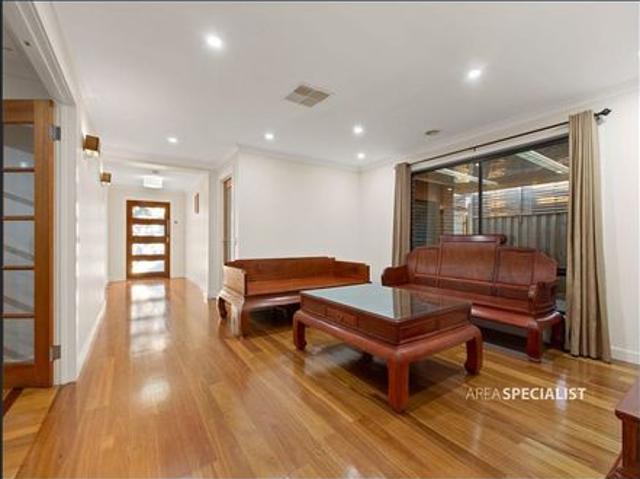 Modern Family Living in Prestigious Marriott Waters Estate