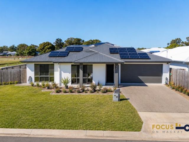 Modern Family Living Opposite Parkland Solar, Shed & Style