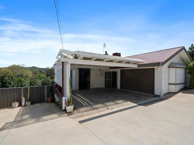 Modern Family Retreat with sweeping views and dual living potential