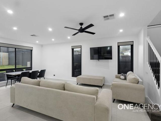 MODERN FAMILY SANCTUARY IN HIGHLY SOUGHT AFTER HUNTLEY