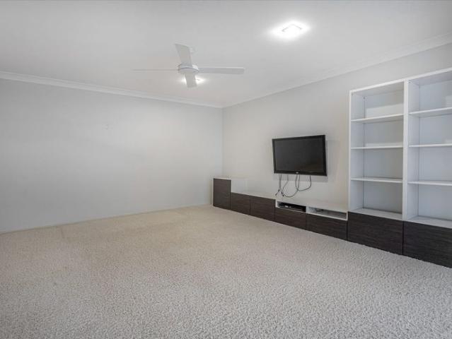 Modern, Feature Packed 4 Bedroom Family Home with Large Shed!