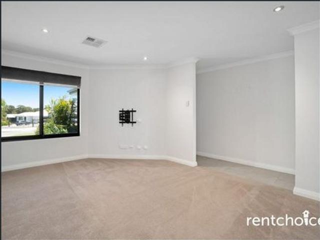 Modern finishes, ample natural light, and a spacious backyard