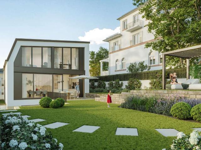 Modern. Freistehend. Exklusiv. – Einfamilienhaus in bester Lage mit großem Garten
