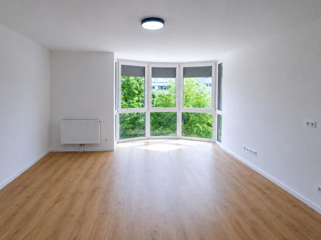 Modern kernsaniert provisionsfrei – stilvolles Wohnen mit besonderer Panorama Fensterfront