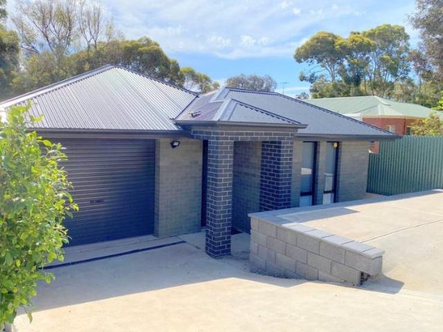 Modern home that offers low maintenance living!