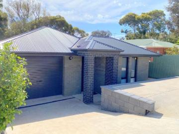 Modern home that offers low maintenance living!