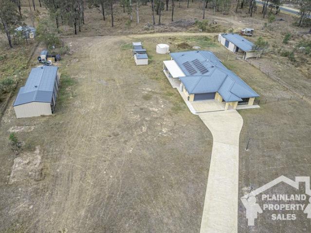 MODERN HOME WITH ACREAGE TO ENJOY