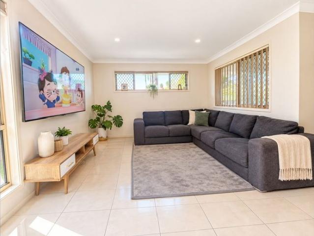 Modern home with colossal living & dining space walking distance to 2 schools