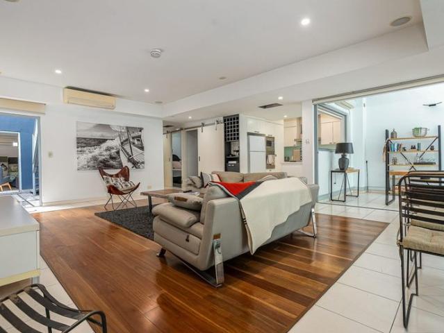 Modern Inner City Living with Exclusive Rooftop Pool & City Views