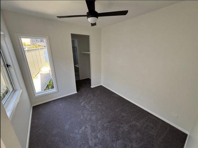Modern One bedroom Air Conditioned Unit at rear of Block