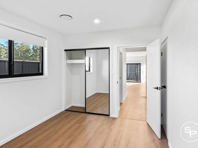 Modern one bedroom home with private yard