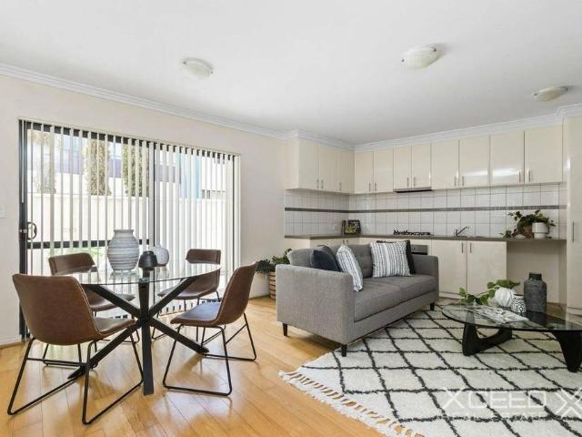 Modern One Bedroom Townhouse Convenient, Low Maintenance Living!