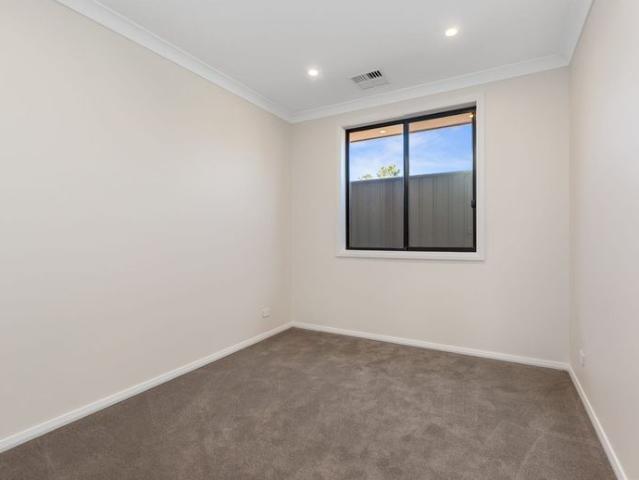 Modern, Low Maintenance & Only One Street Back From The Beach
