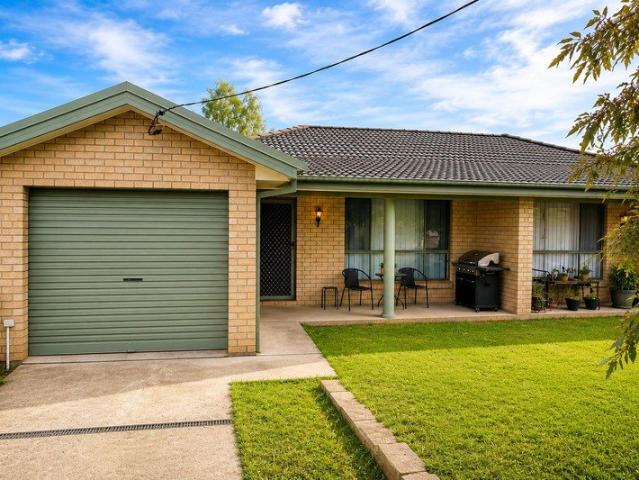 Modern, Low Maintenance Duplex with Spacious Backyard