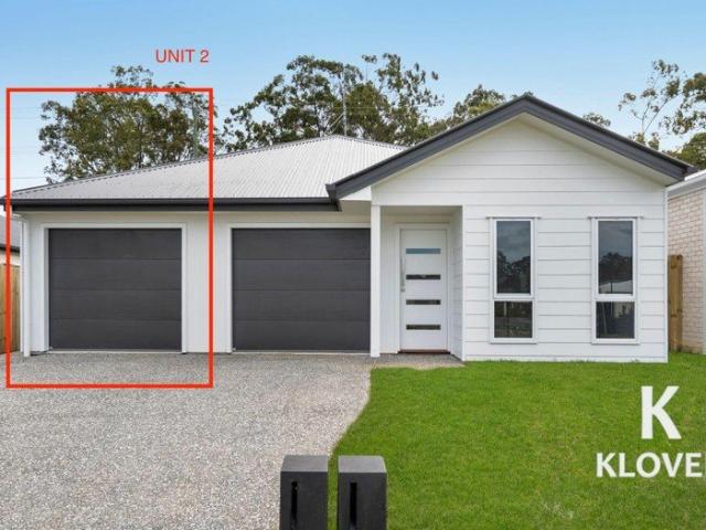 Modern & Low Maintenance Duplex in a Convenient Logan Reserve Location