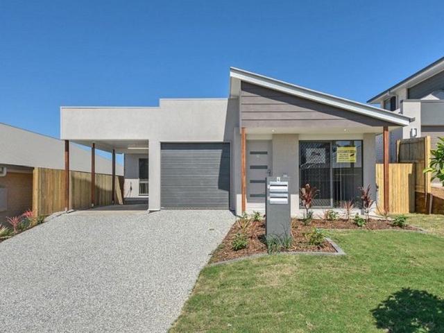 Modern, Low Maintenance Living with Air Conditioning in Convenient Location