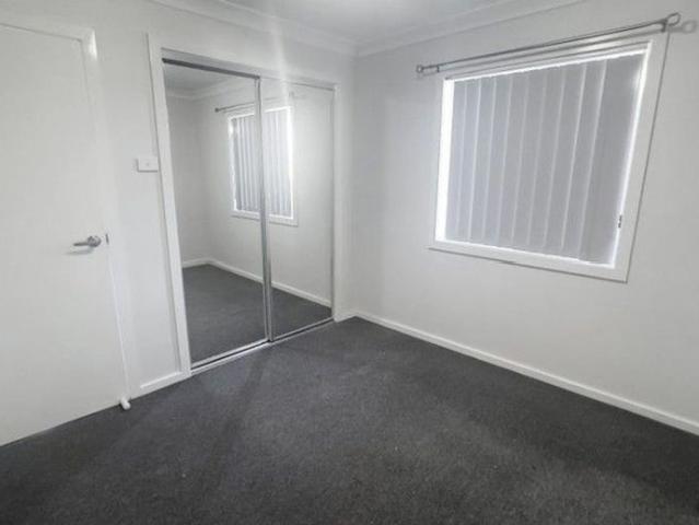 Modern, Low Maintenance Living with Plenty of Extras!
