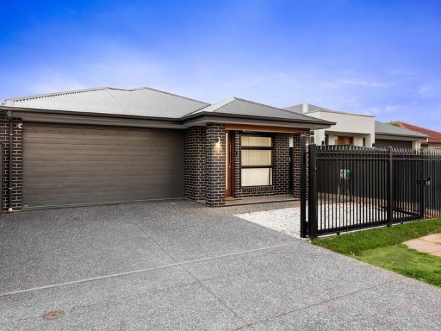 Modern Low Maintenance Living with Premium Upgrades