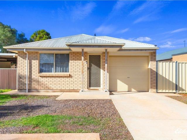 MODERN, LOW MAINTENANCE LIVING WITH PROVEN RENTAL STABILITY