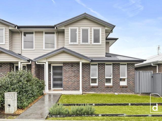 Modern, Low Maintenance Living with Stunning Street Appeal