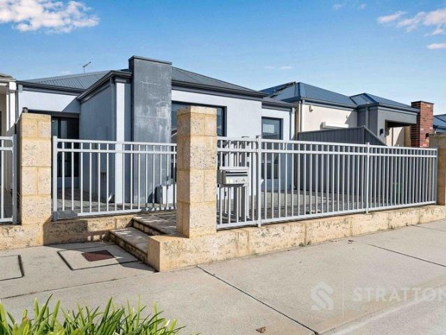 Modern, Low Maintenance Living with Secure Rear Garage Access