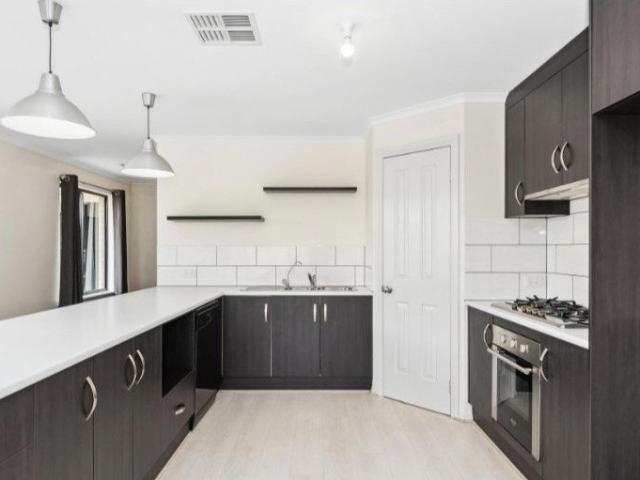 Modern, Low Maintenance Living with Two Living Areas & Double Carport