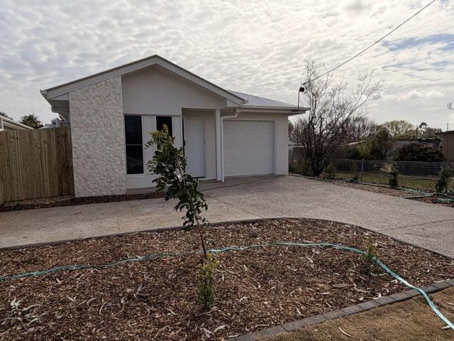 Modern, Low Maintenance Living Close to Town & Schools