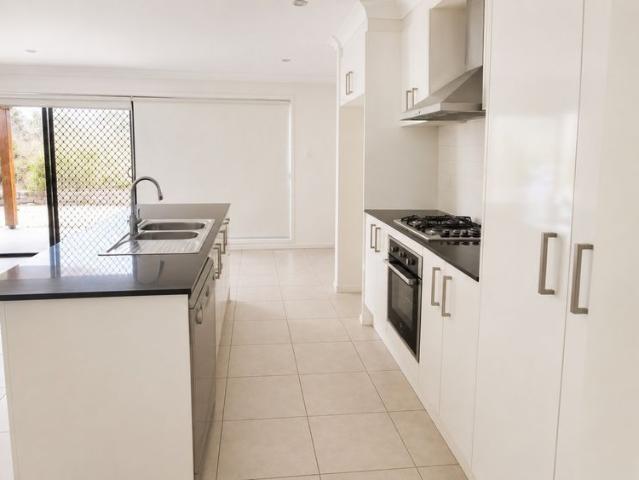 MODERN, LOW MAINTENANCE LIVING IN THE HEART OF AUGUSTINE HEIGHTS