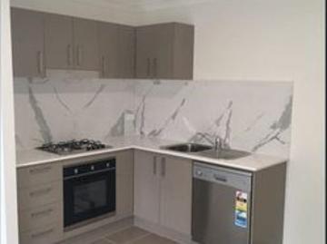 Modern & Low Maintenance Living in a Convenient Location