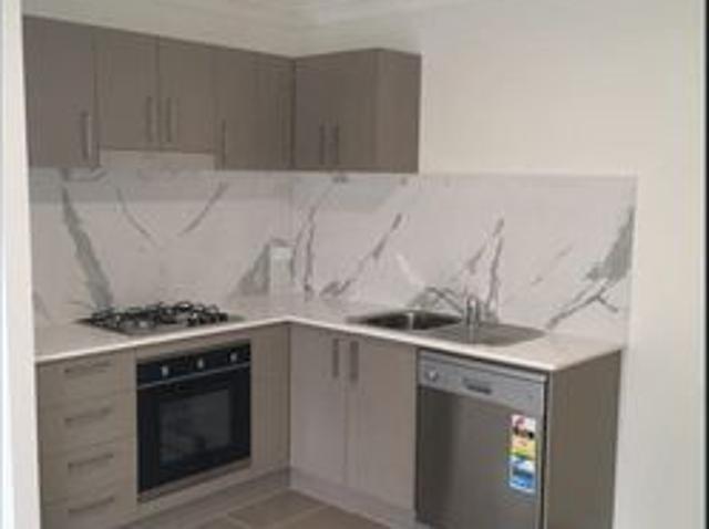 Modern & Low Maintenance Living in a Convenient Location