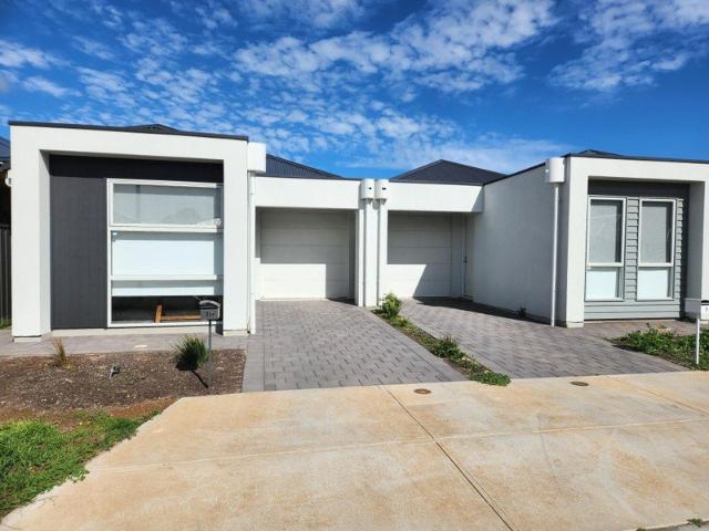 MODERN, LOW MAINTENANCE LIVING IN A CONVENIENT LOCATION
