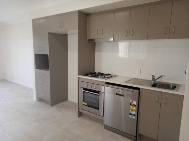Modern & Low Maintenance Living in a Convenient Location