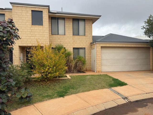 Modern, Low Maintenance Living in a Prime Location