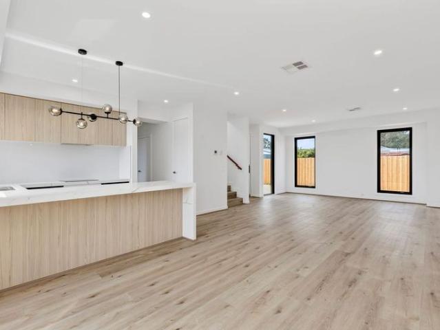 Modern, Low Maintenance Living in a Recently Built Three Bedroom Unit