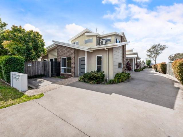 Modern, Low Maintenance Living in an Ultra Convenient Location!
