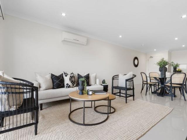 Modern, Low Maintenance Living in Carina Heights