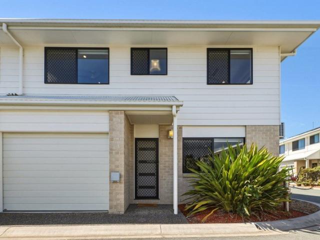 Modern Low Maintenance Living In Prime Location