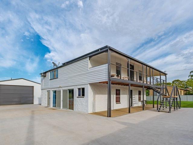 Modern & Low Maintenance Living in Quiet Howard Location