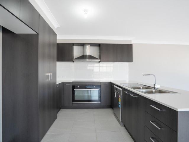Modern Low Maintenance Living in Sought After Farley