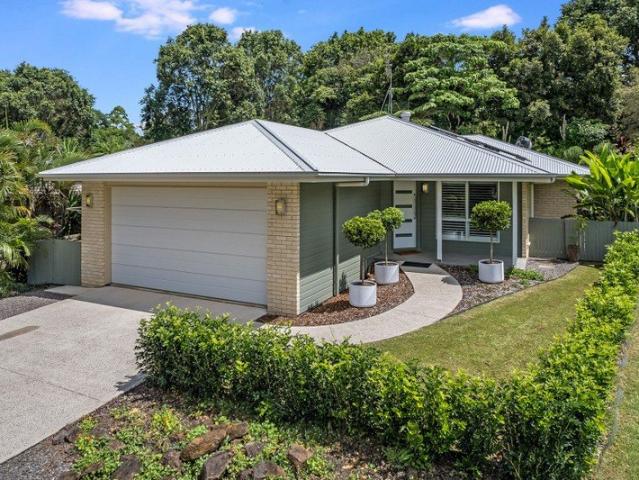MODERN, LOWSET HOME IN LEAFY LOCALE