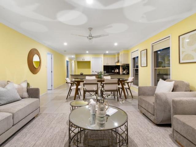 Modern Lowset Home with Media Room, Solar, Air Conditioning & Side Access