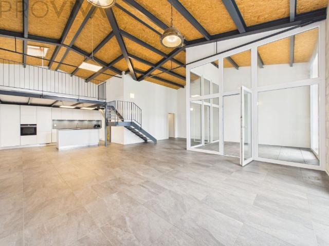 Modern loft apartment with gallery in Gampelen