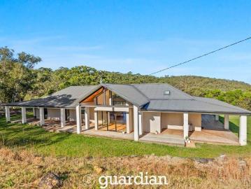 Modern living, country charm & 25 private acres