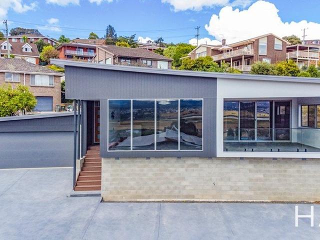 Modern Living In A Peaceful Riverside Setting