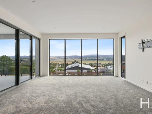 Modern Living In A Peaceful Riverside Setting