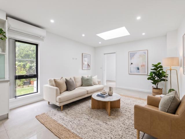 Modern Living in a Prime Location Low Maintenance & Convenient!