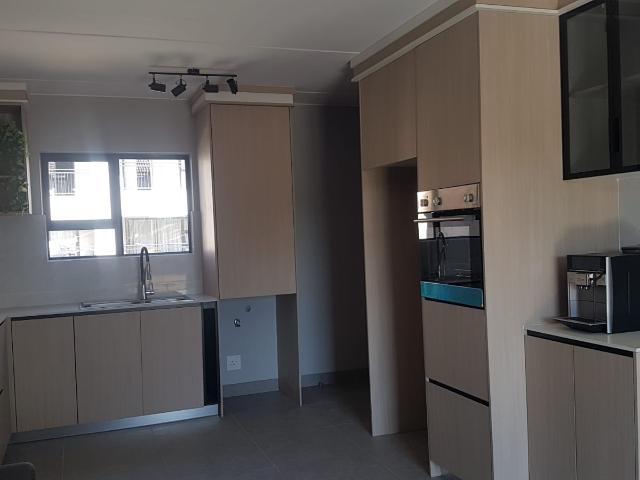 Modern Living in quiet top floor unit!